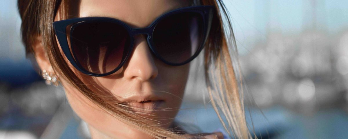 Woman wearing cateye sunglasses.
